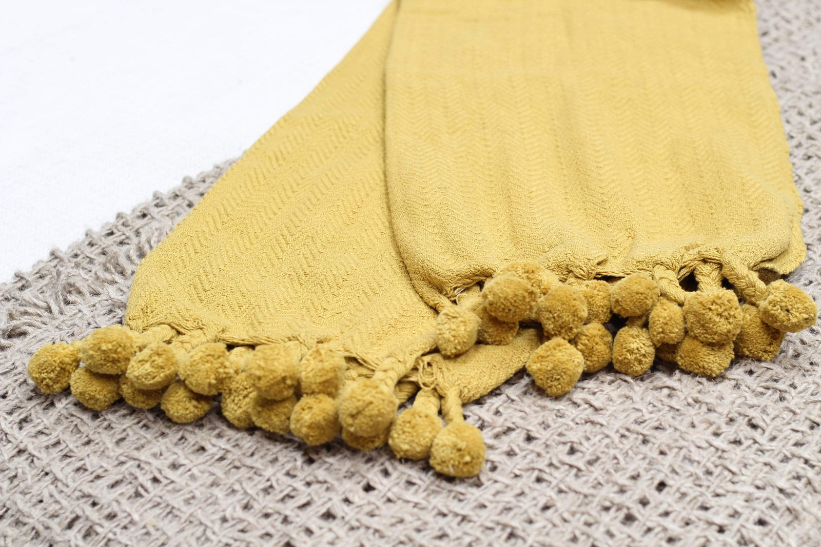 Golden Mustard Pom Pom Throw The Address for Home Interiors