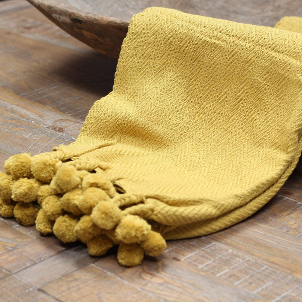 Golden Mustard Pom Pom Throw The Address for Home Interiors